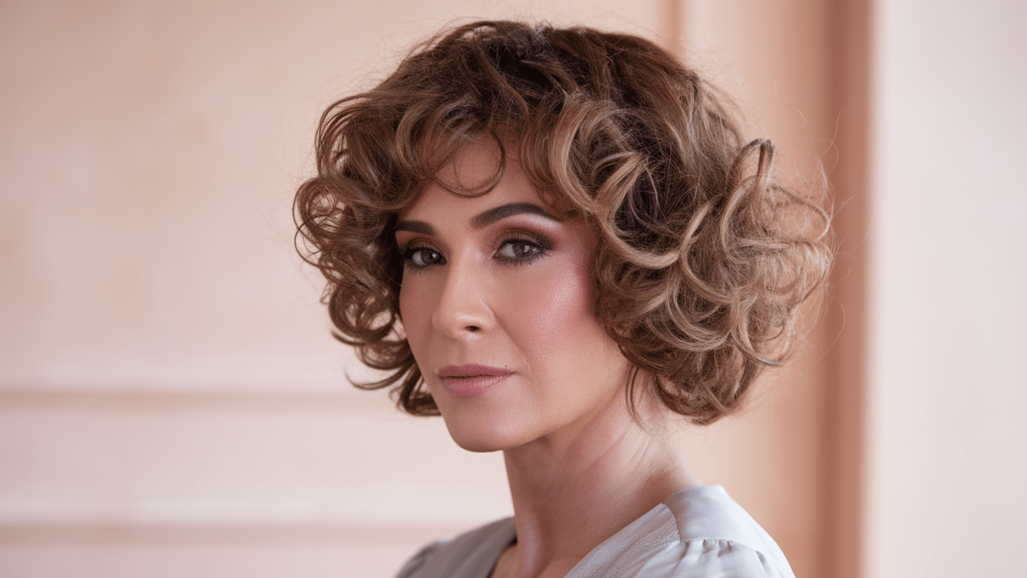 Curly medium cut with layers