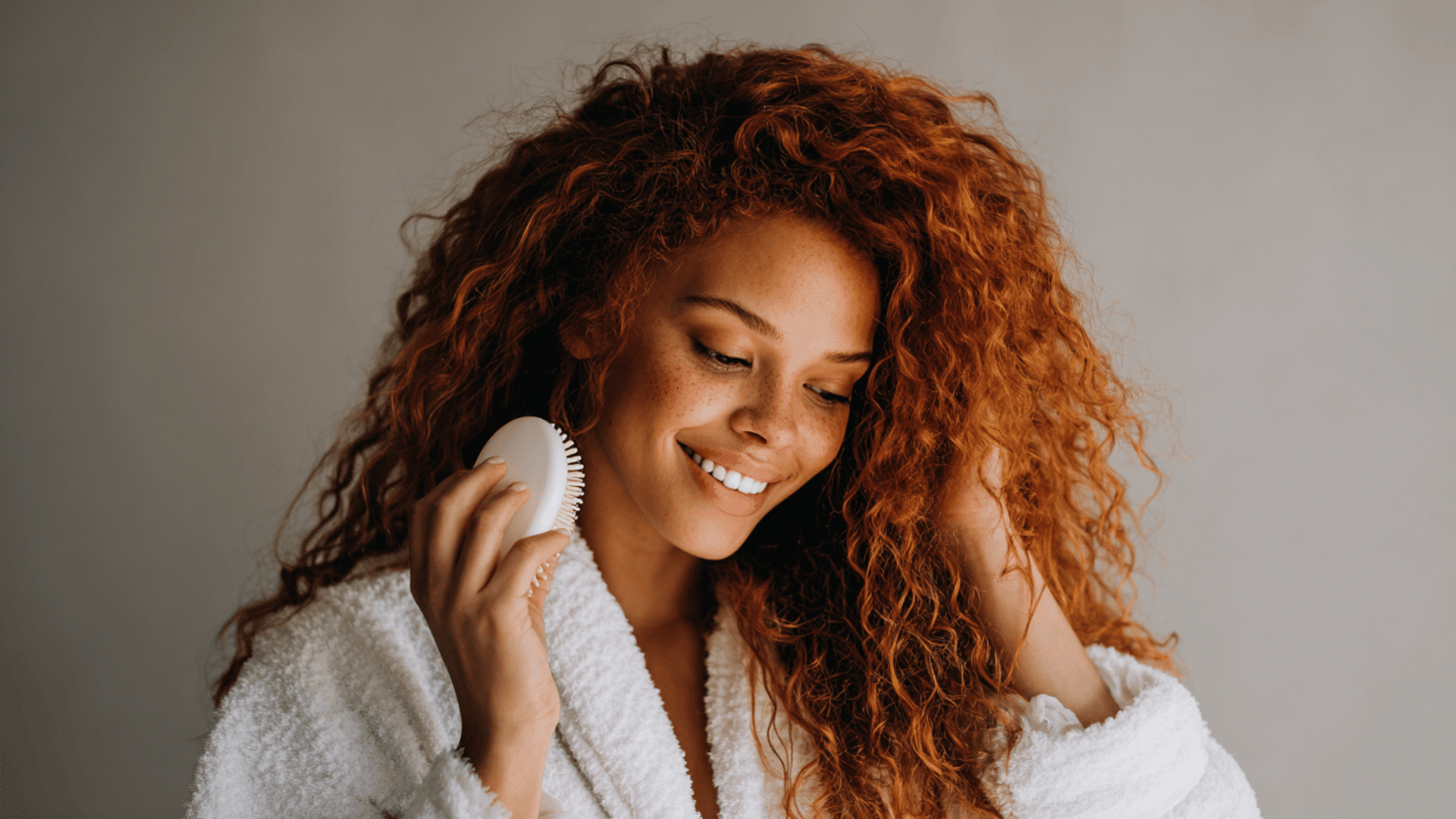 woman brushing her hair