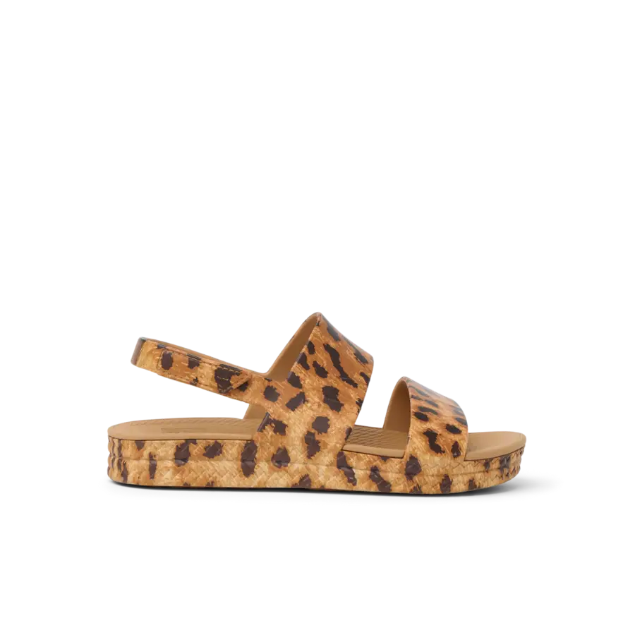 Leopard print sandal with ankle strap on white background