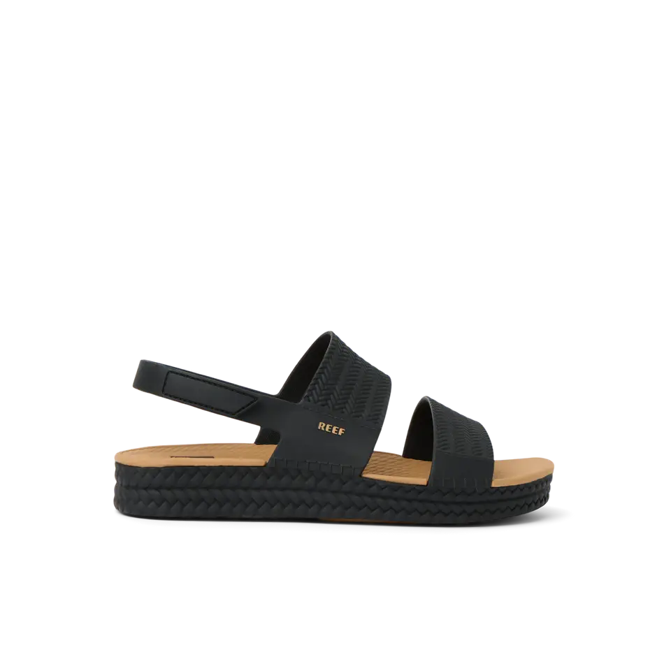 Black woven sandal with dual straps and tan sole on white background