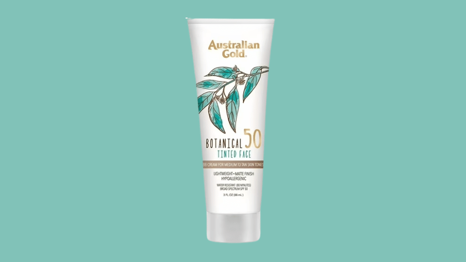 Australian Gold Botanical Mineral Tinted SPF 50 sunscreen on a plain background