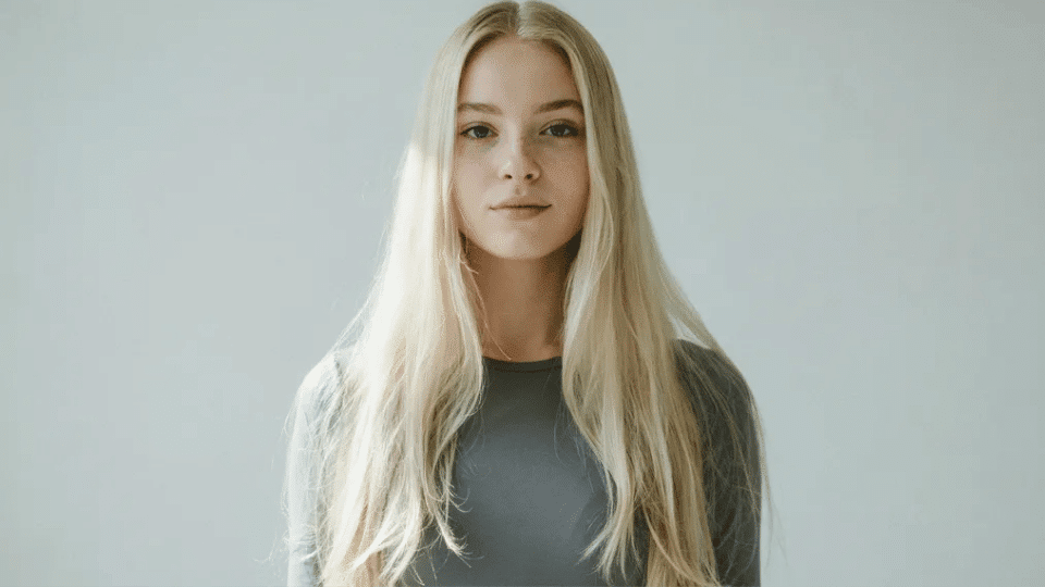 woman with ultra-long platinum blonde hair