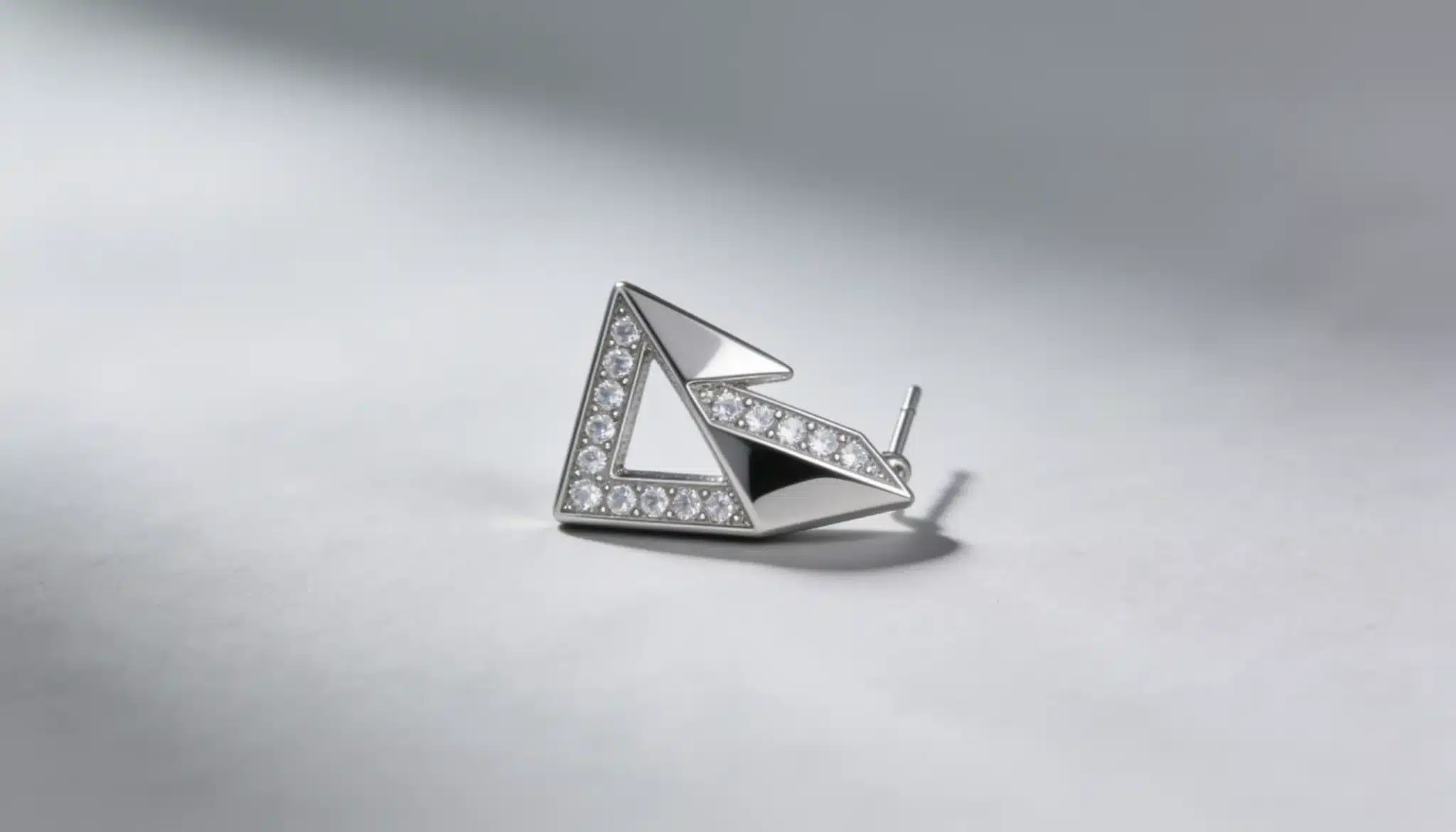 Unique single earring worn individually for modern asymmetrical styling