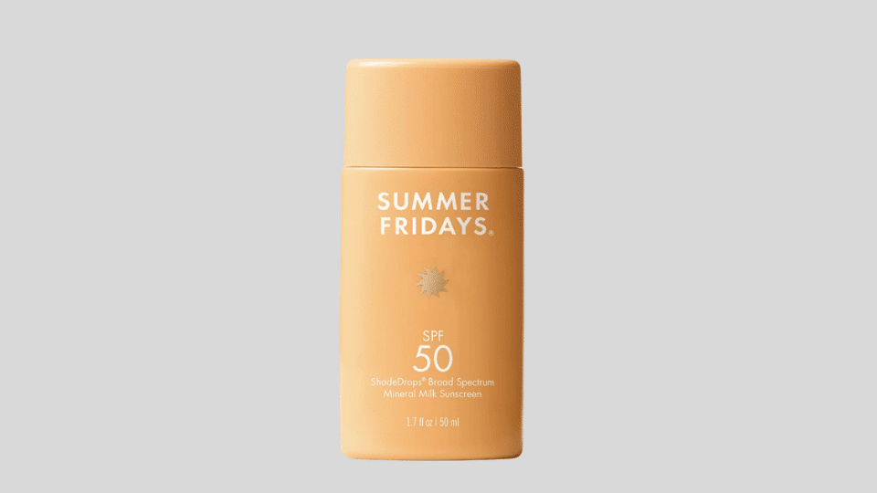 Summer Fridays ShadeDrops Broad Spectrum sunscreen on a plain background