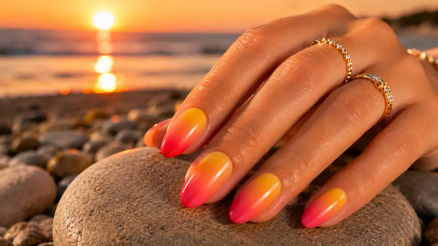 Sunset ombre nails with warm gradient colors