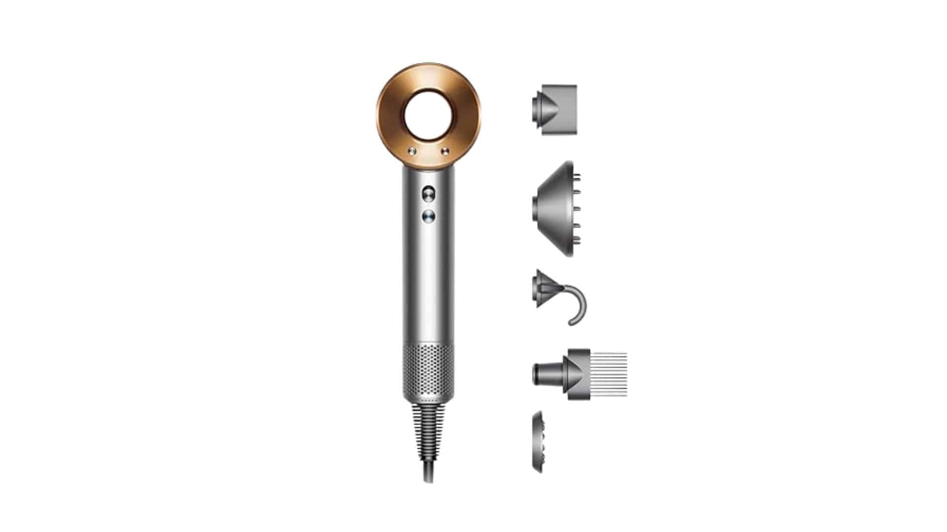 Dyson Supersonic Hair Dryer with diffuser attachment styling curly hair, showing long prongs and sleek design for frizz-free curls.