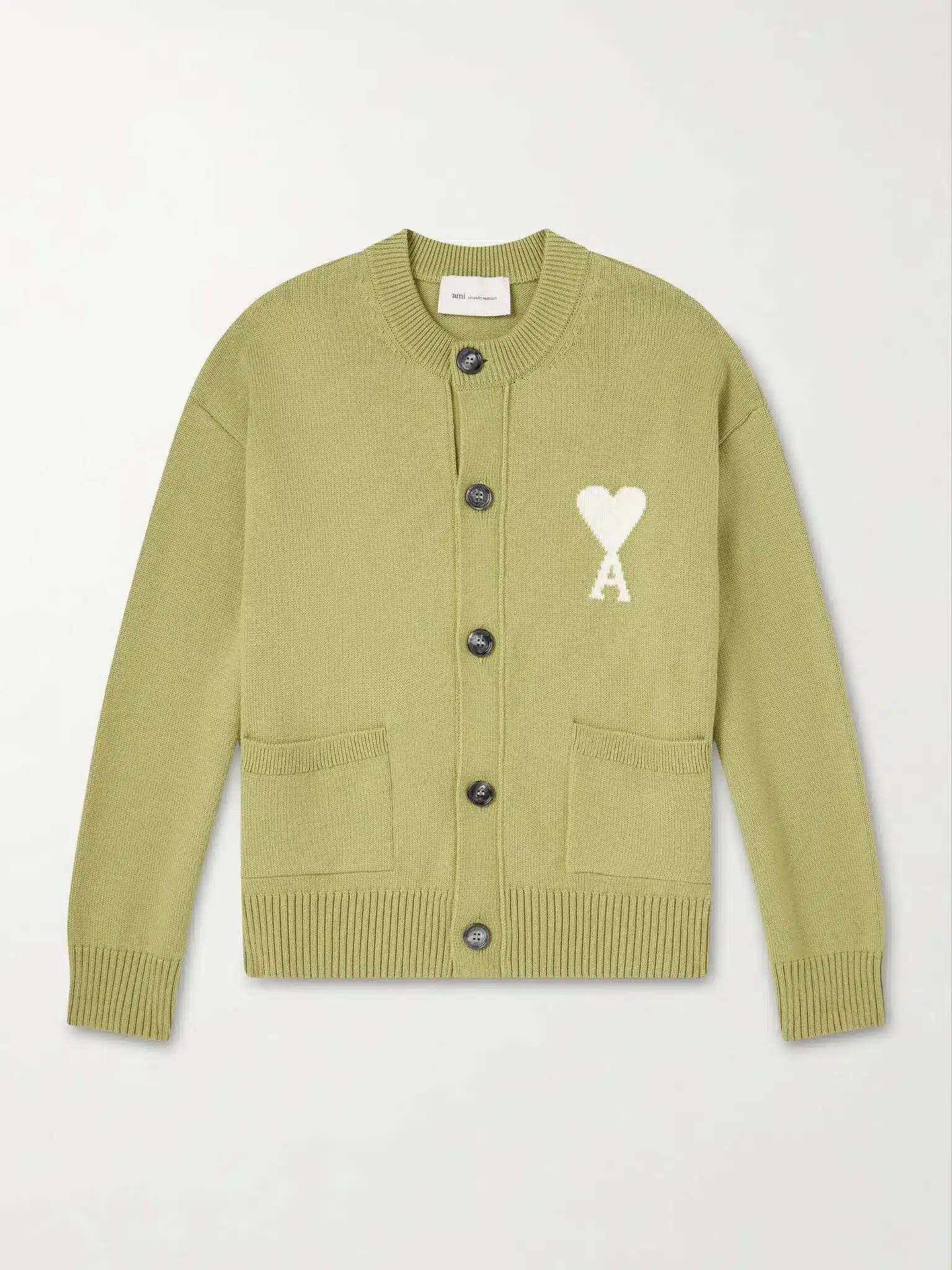 Olive green cardigan with heart logo and black buttons on plain background